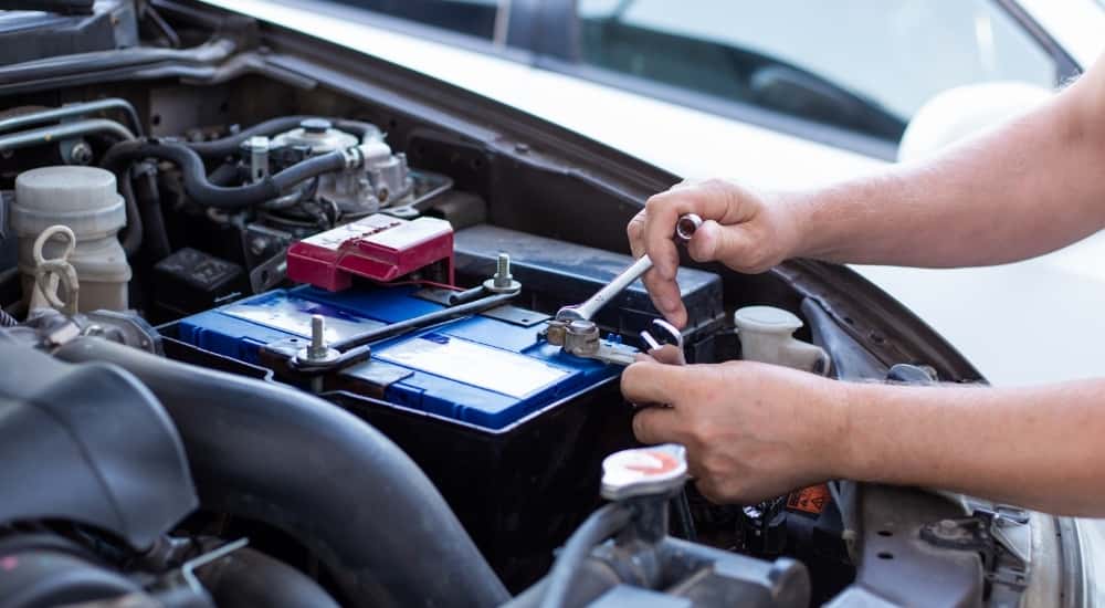Technician installing a battery