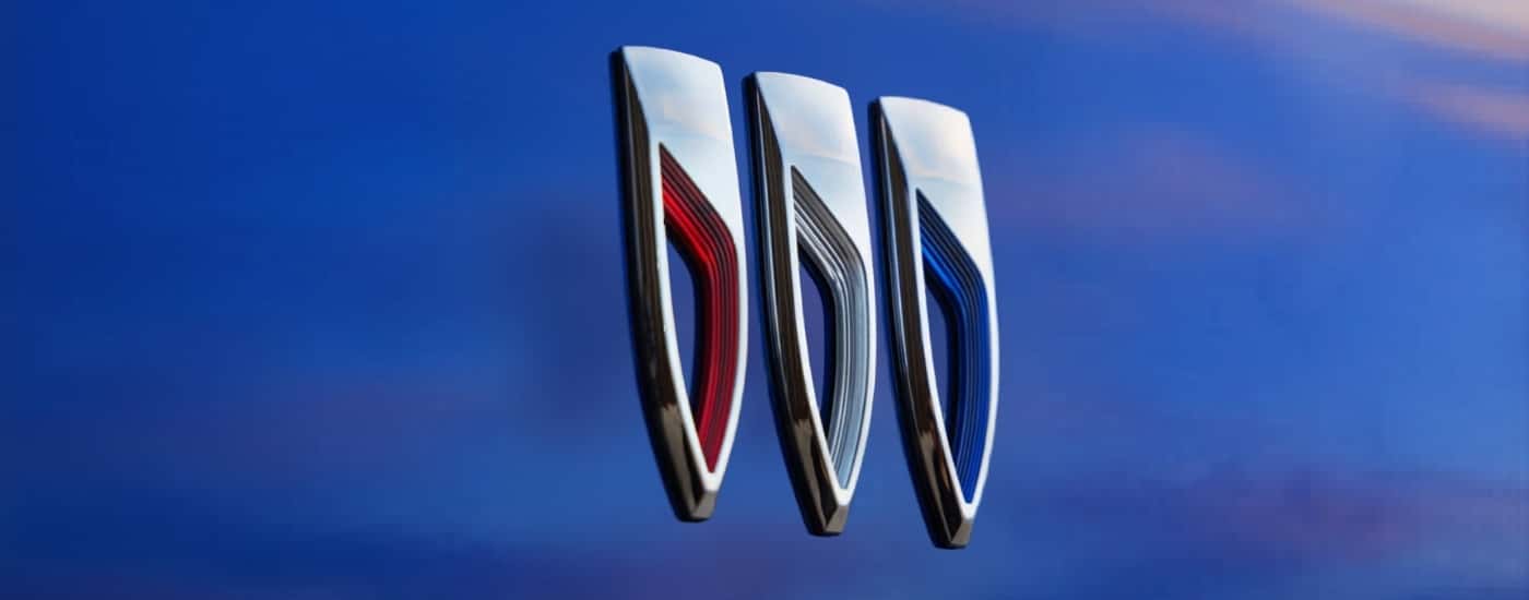 Badge on a blue 2024 Buick Envision