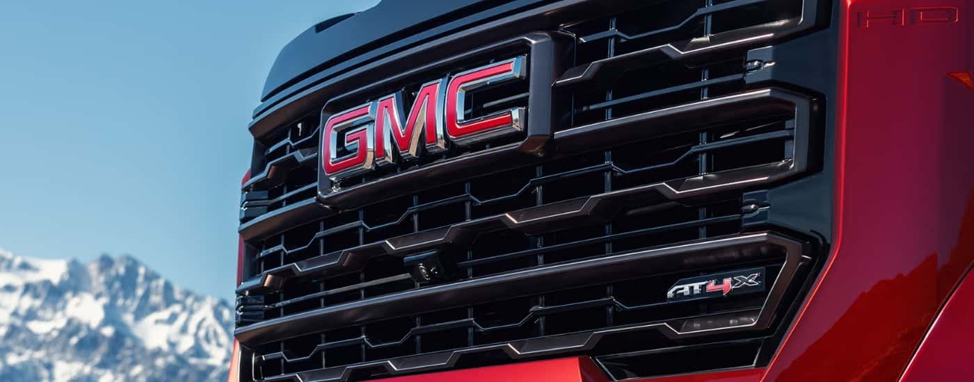 Grille on a red 2025 Sierra 2500 HD AT4X