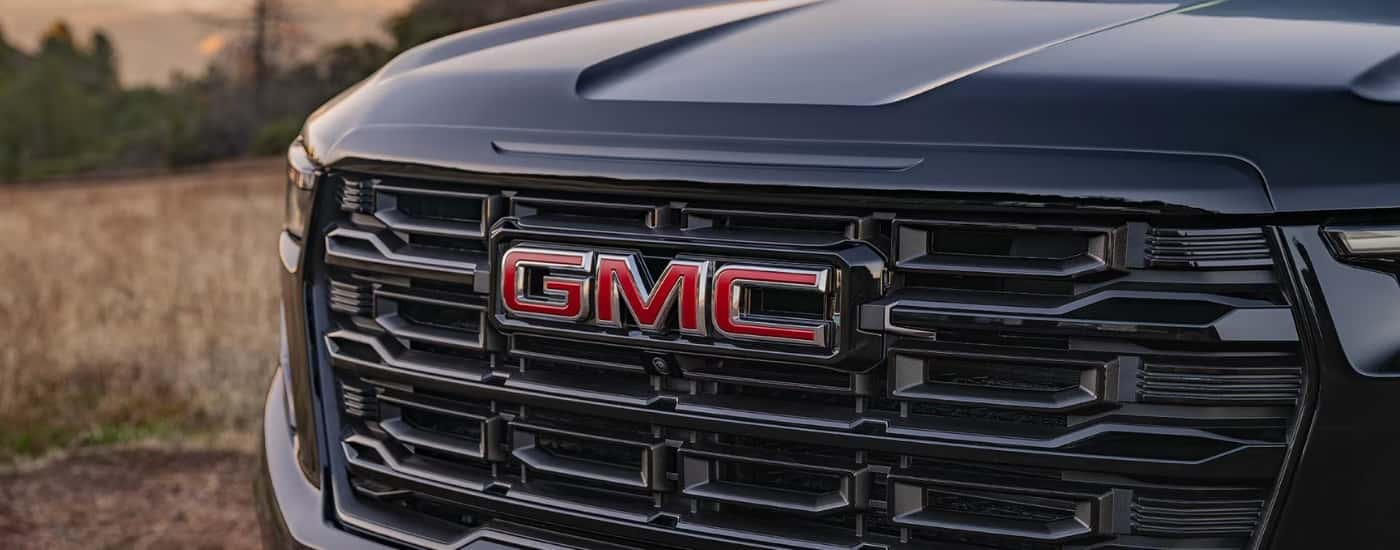 Grille on a black 2026 GMC Acadia