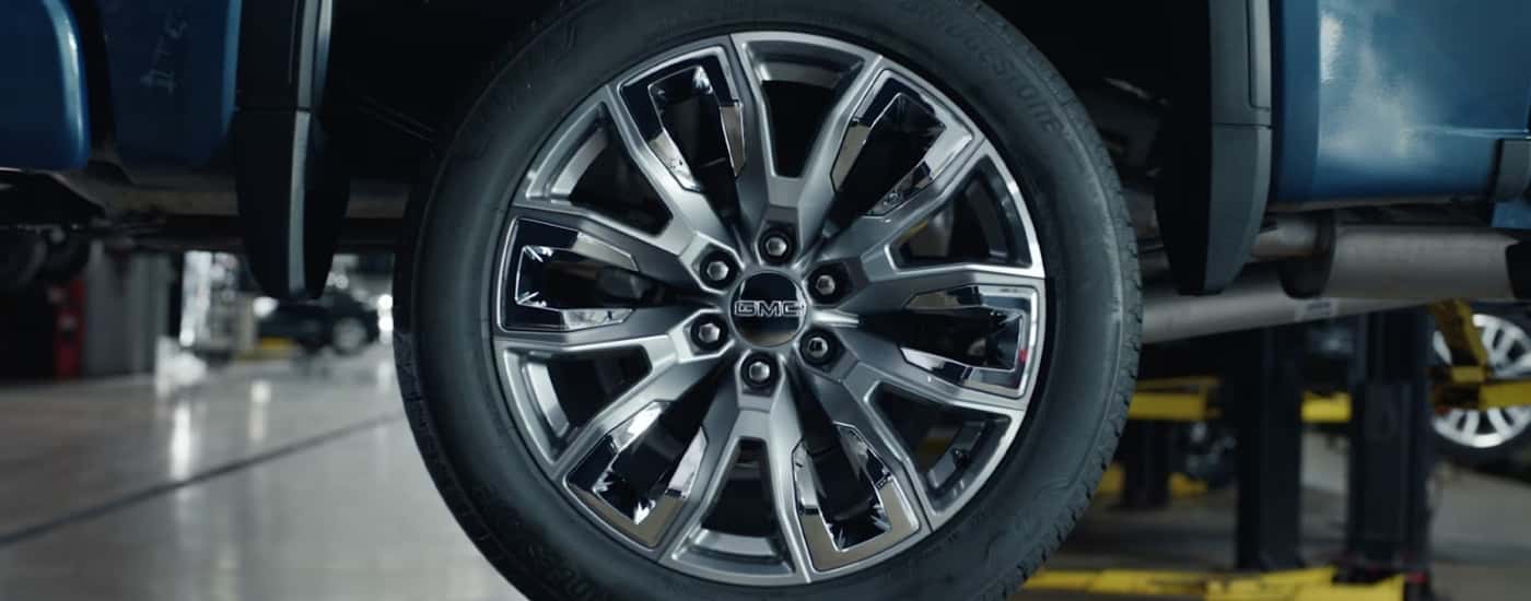 Close-up on a wheel at a GMC service center near Monroe