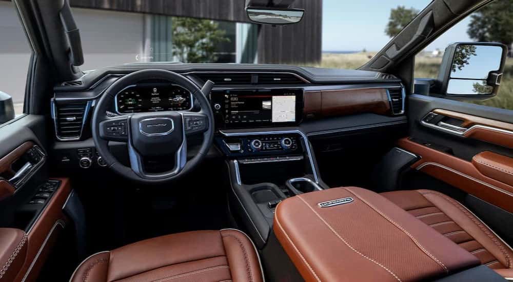 Black and brown interior and dash in a 2027 GMC Sierra 2500 HD.