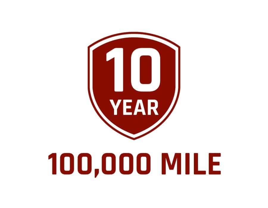 Red shield badge reading 10 year 100,000 mile powertrain limited warranty