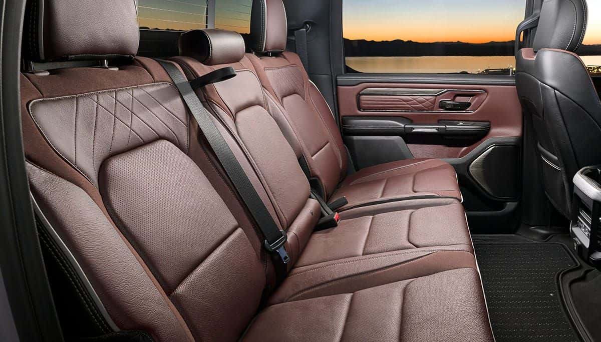 Brown diamond-stitched leather rear seats inside a 2026 Ram 1500 Limited 4x4 Crew Cab