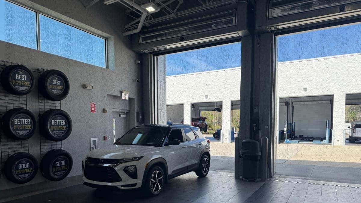 Chevrolet SUV exiting service bay after routine maintenance inspection in New Smyrna Beach, Florida
