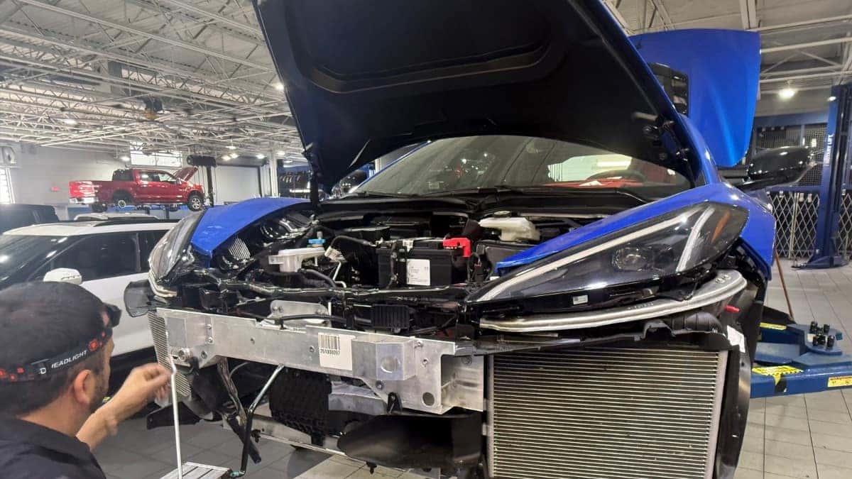 Chevrolet technician inspecting a vehicle at New Smyrna Beach Chevrolet service center