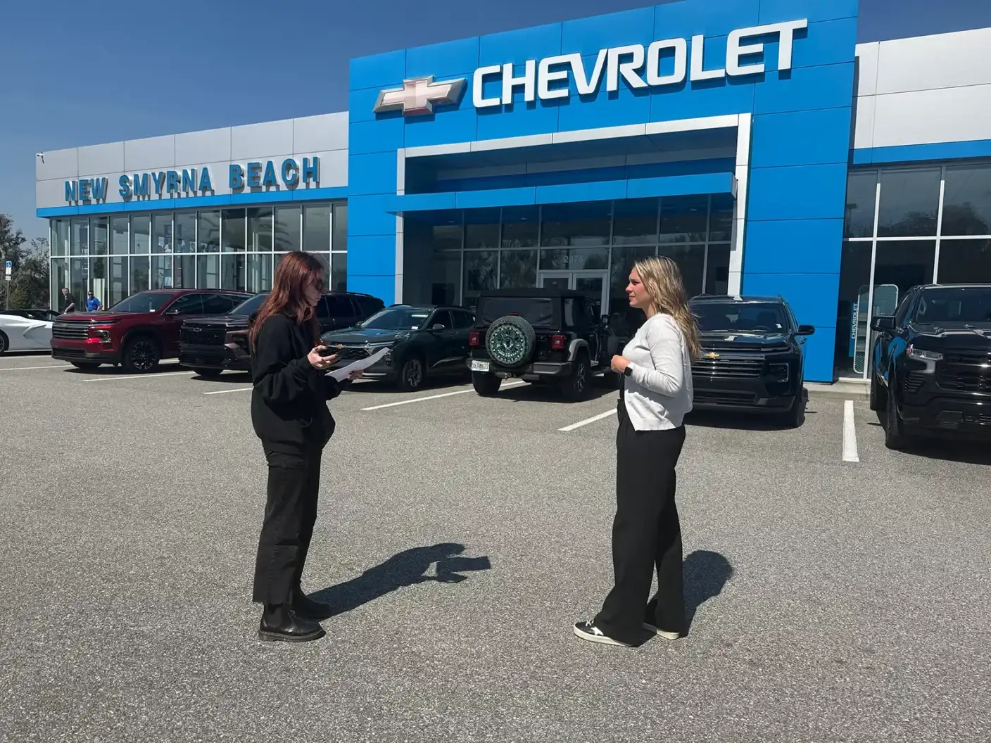 Chevrolet SUV showroom consultation at New Smyrna Beach Chevrolet in Florida