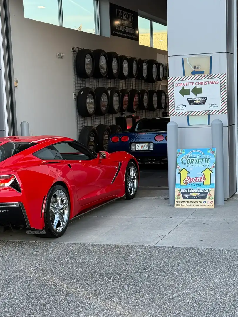 Corvette Christmas display inside New Smyrna Beach Chevrolet showroom