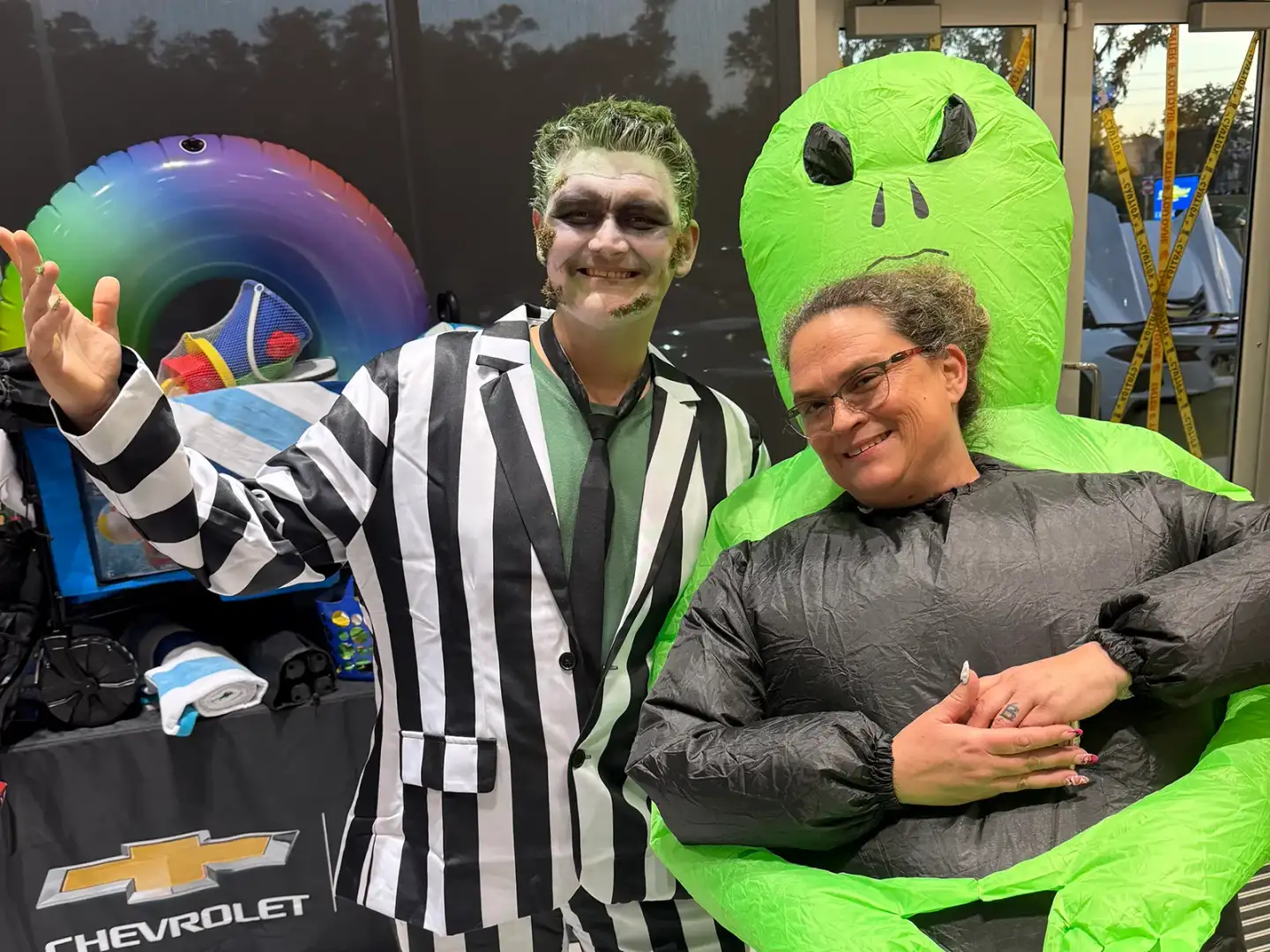 Beetlejuice and alien costumes at Halloween Trunk or Treat
