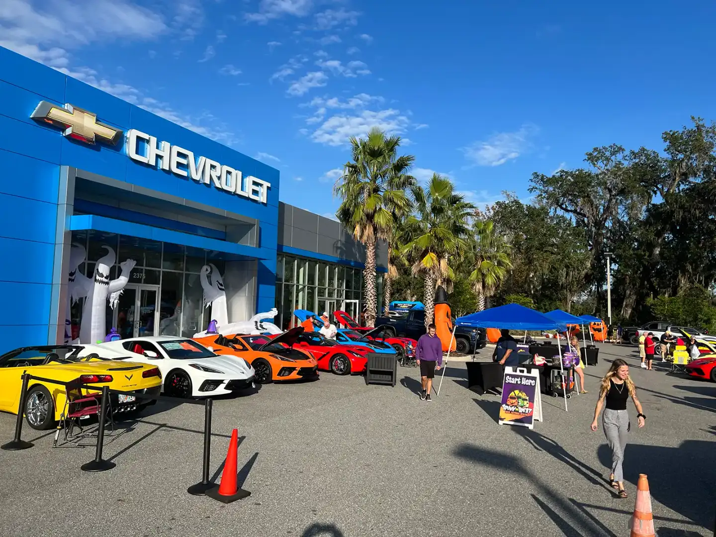 Corvette lineup outside New Smyrna Beach Chevrolet during Halloween Trunk or Treat