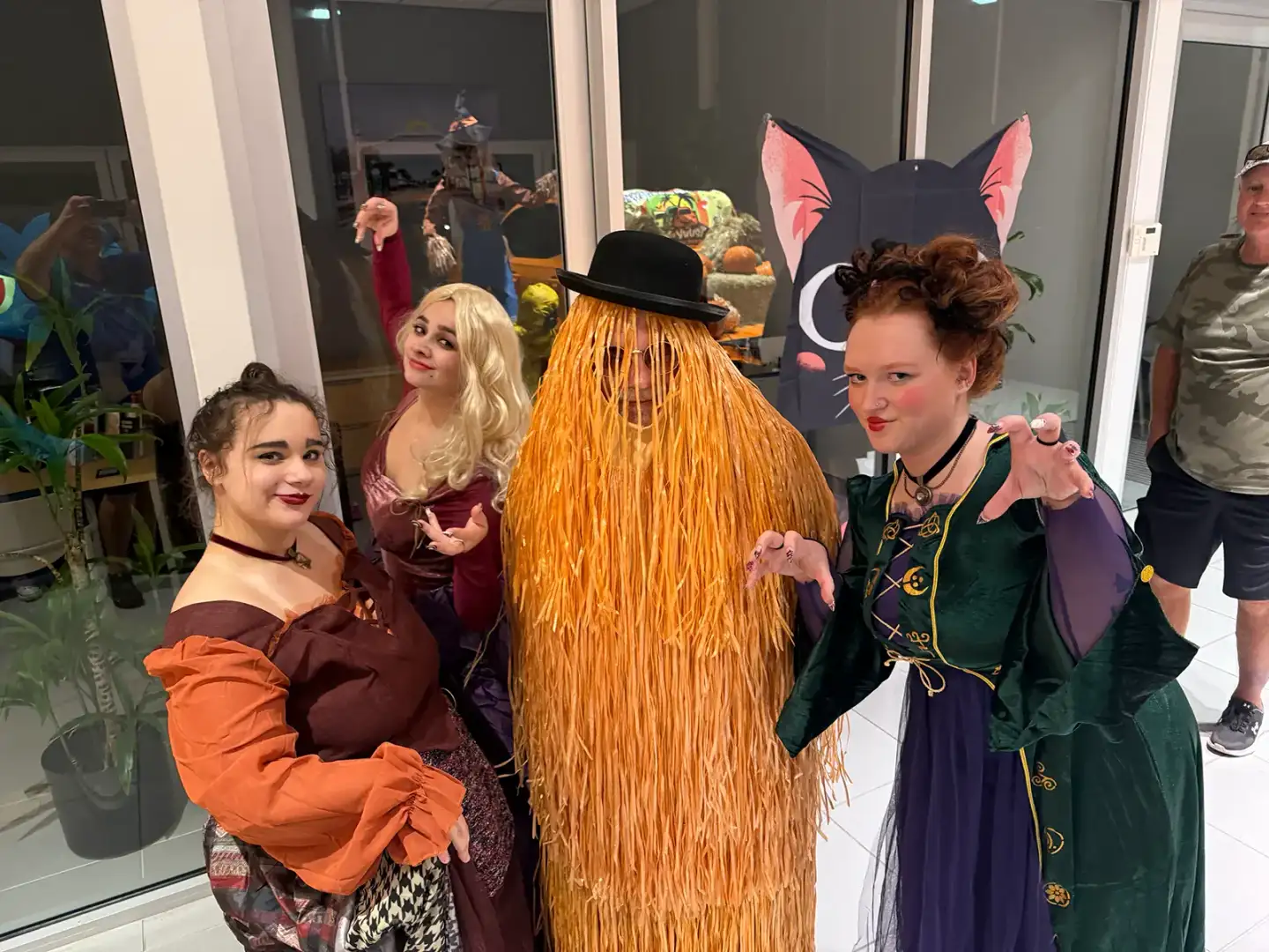 Guests dressed in Halloween costumes at New Smyrna Beach Chevrolet event