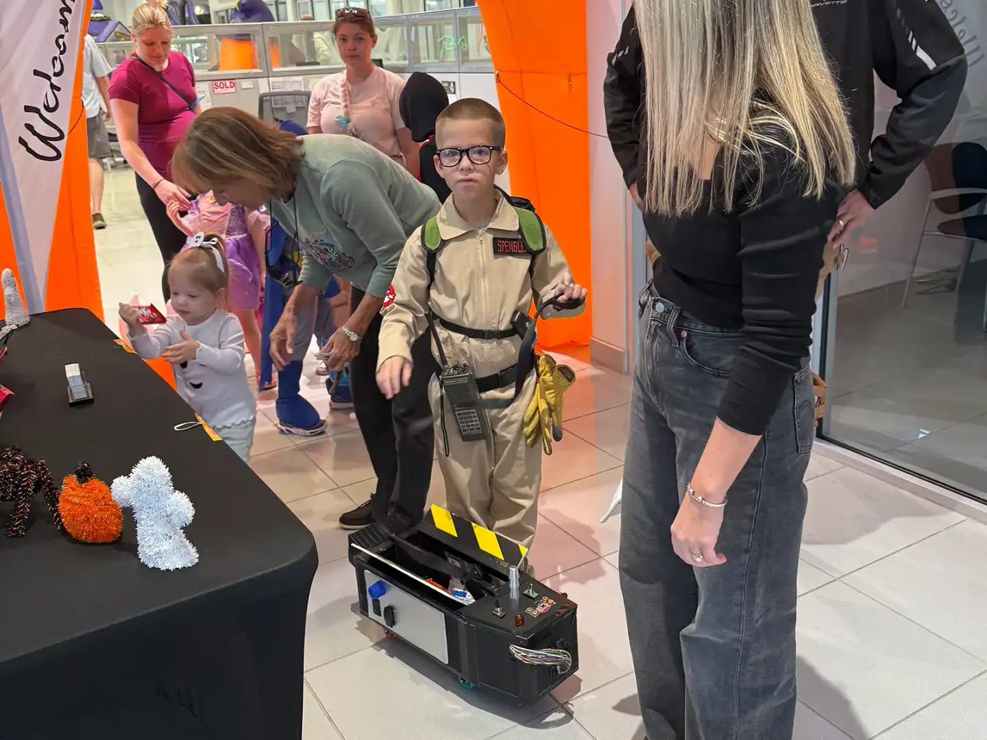 Child dressed as Ghostbusters character at Halloween Trunk or Treat