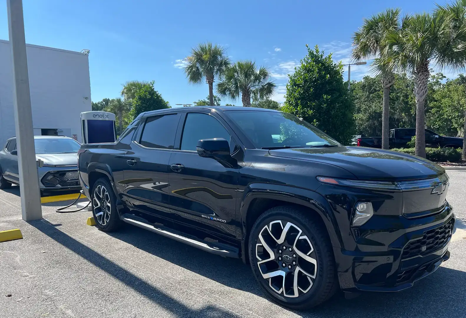 Customer learning about Chevrolet electric vehicle options at New Smyrna Beach Chevrolet