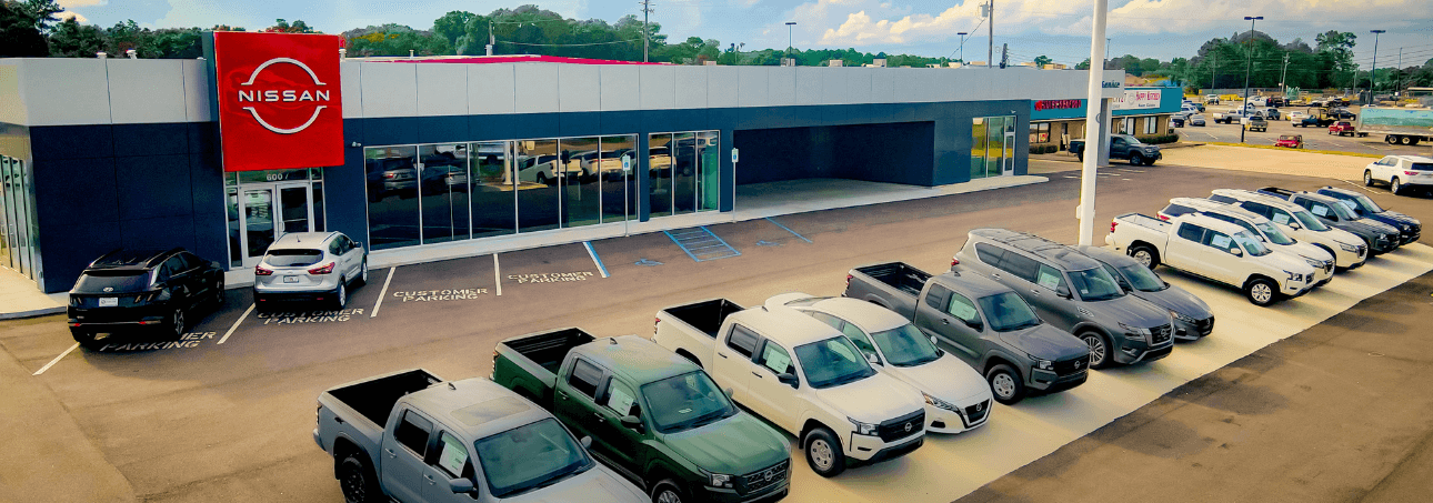 An exterior shot of Nissan dealership