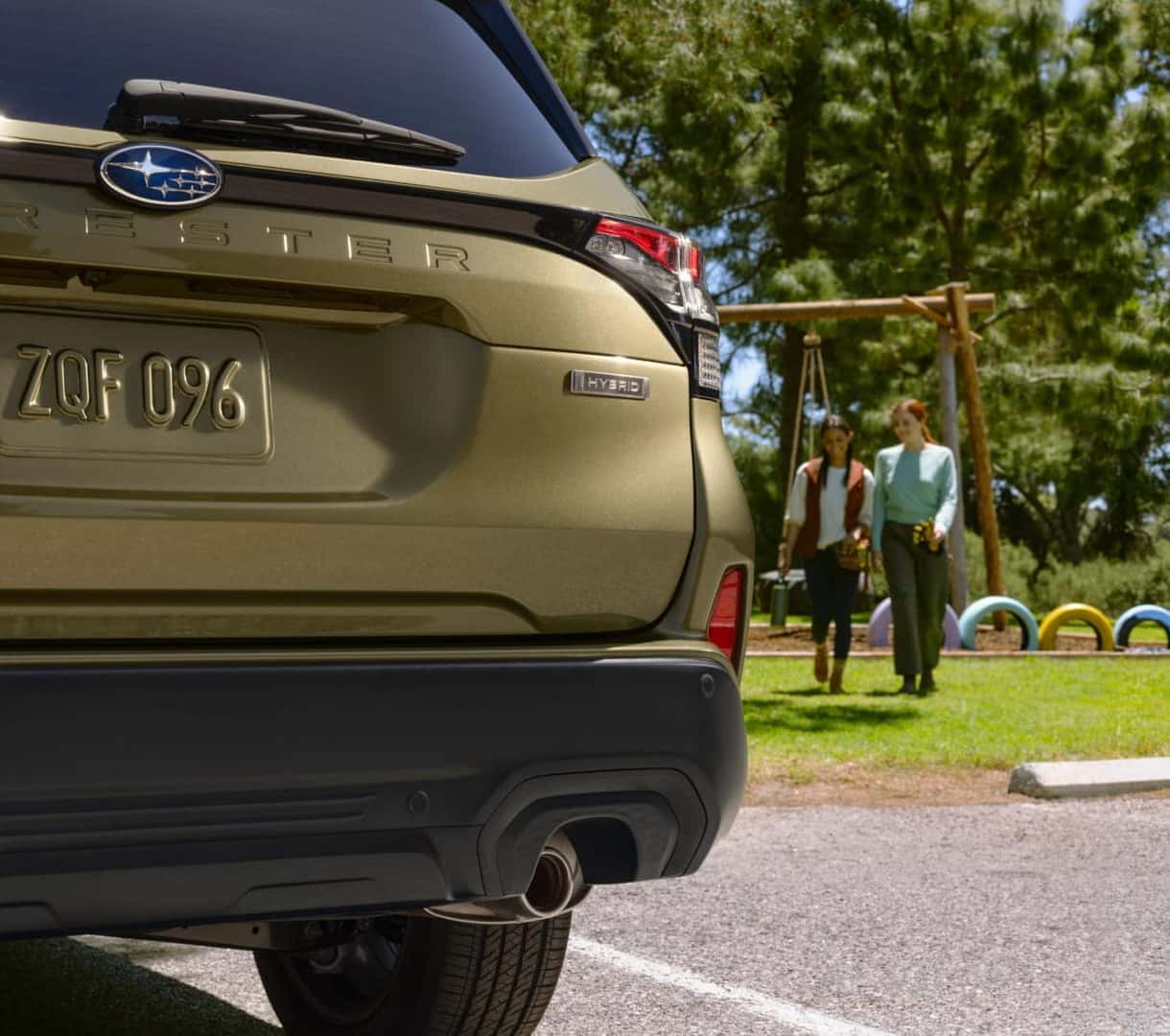 Close-up of a 2026 Subaru Forester Hybrid's rear in a park setting.