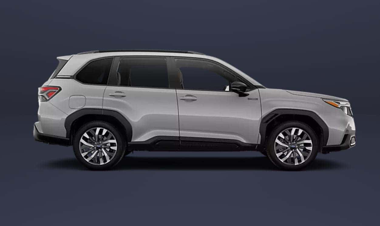 Side view of a sleek, 2026 Subaru Forester Hybrid with modern design features. The vehicle is set against a dark gray background, highlighting its aerodynamic shape.