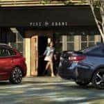 2023 Subaru Impreza models in blue and red