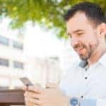 Man in a wheel chair on his phone