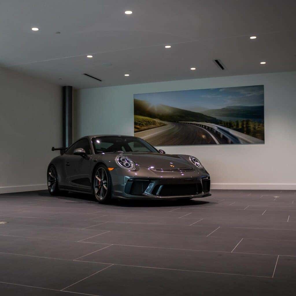 A Porsche 911 is parked at Porsche Edison.