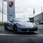 A Porsche sits in front of our Porsche Edison sign in New Jersey.