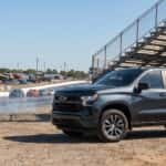 2026 Chevrolet Silverado 1500 parked at Rockingham Dragway grandstands on NHRA event day in Rockingham, NC
