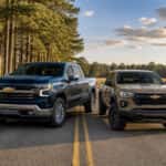 2026 Chevrolet Silverado 1500 and 2026 Chevrolet Colorado parked side by side on a rural North Carolina road near Rockingham