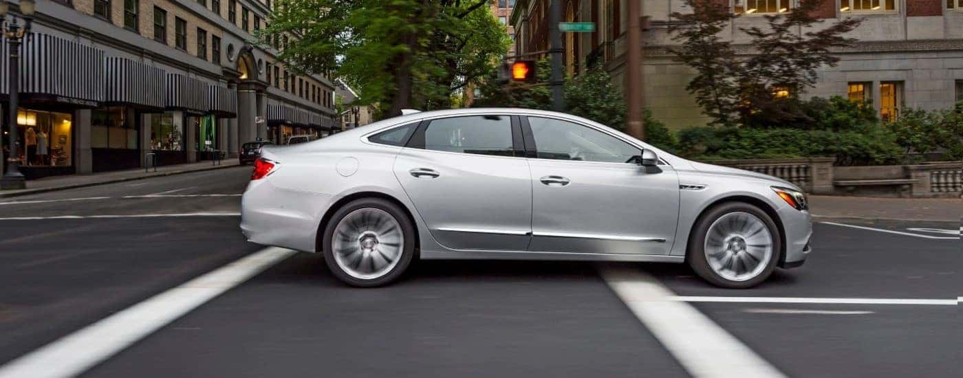 Silver 2018 Buick LaCrosse driving to a Buick Dealer