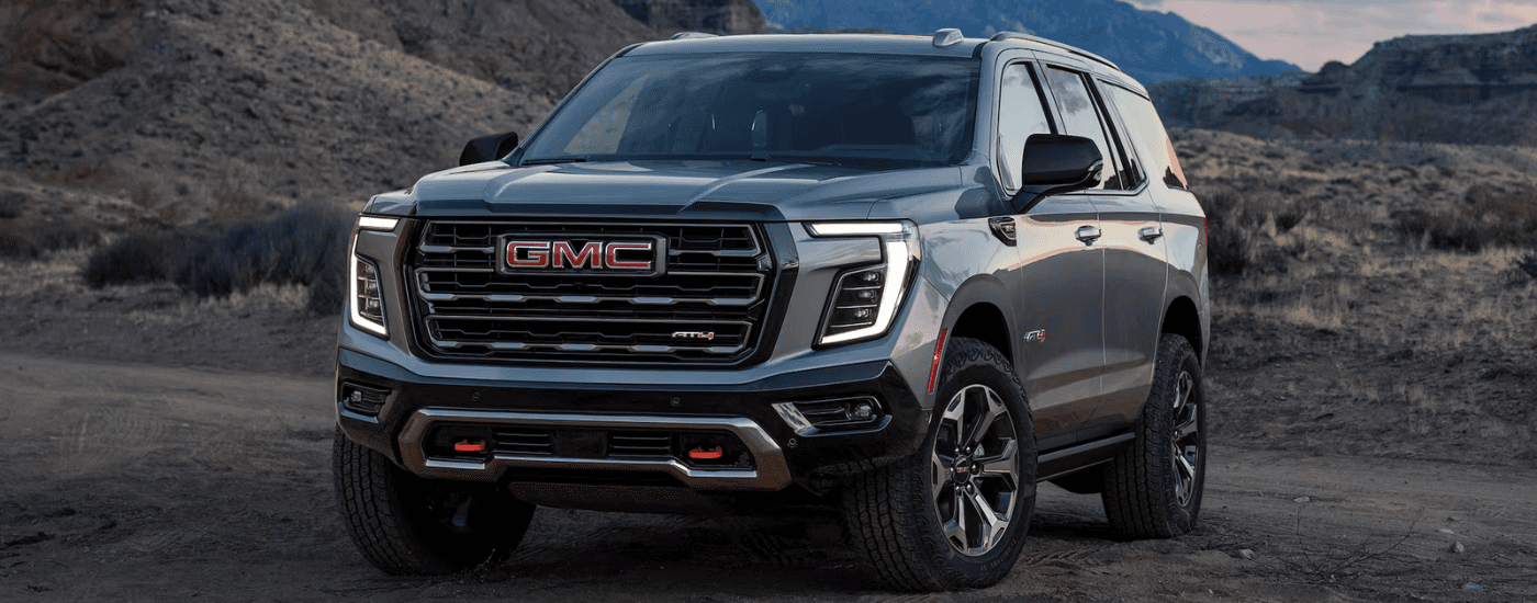 Grey 2026 GMC Yukon AT4 parked at an angle