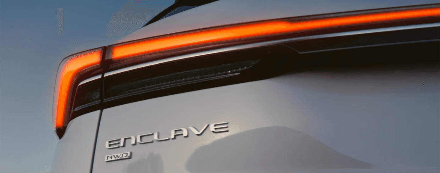 Rear badging of a champagne 2026 Buick Enclave