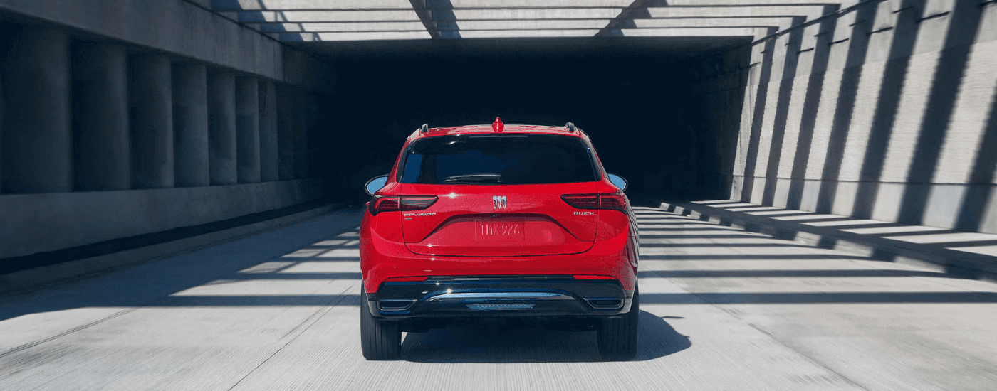 Red 2026 Buick Envision from the rear on an expressway