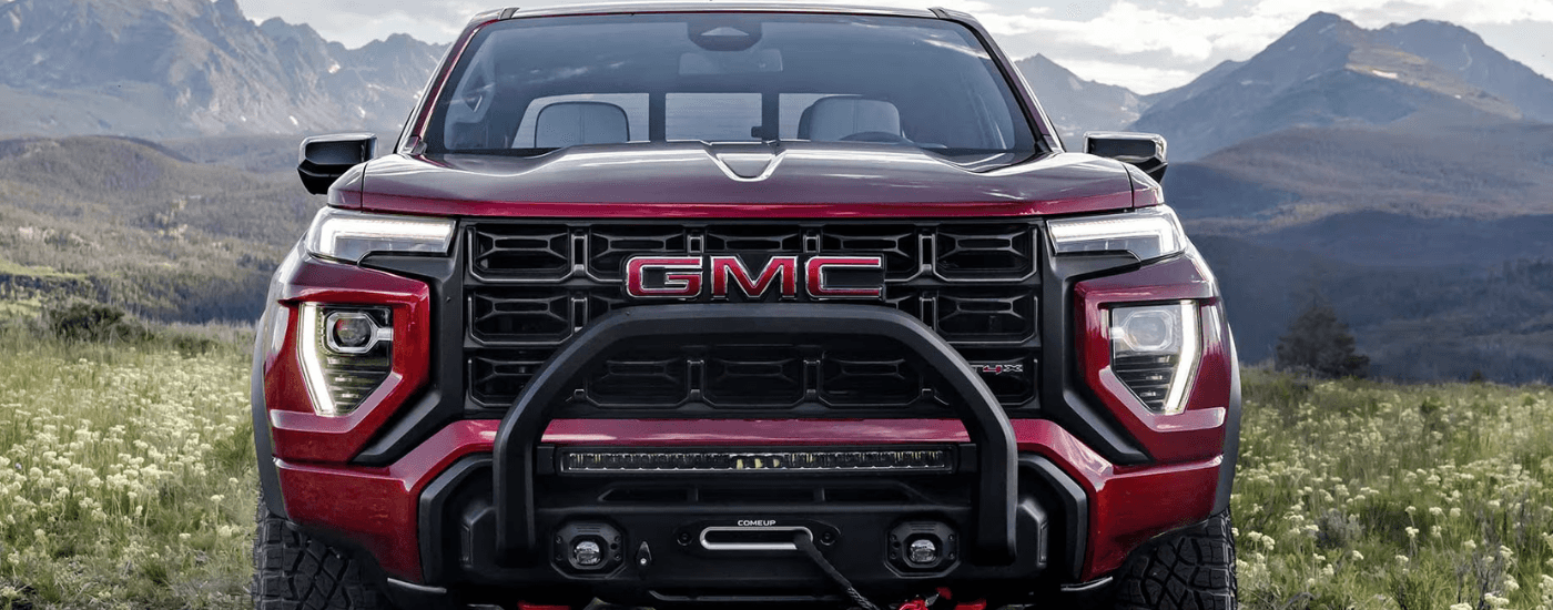 Red 2024 GMC Canyon head on