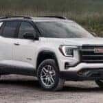A white 2026 GMC Terrain AT4 parked outdoors.