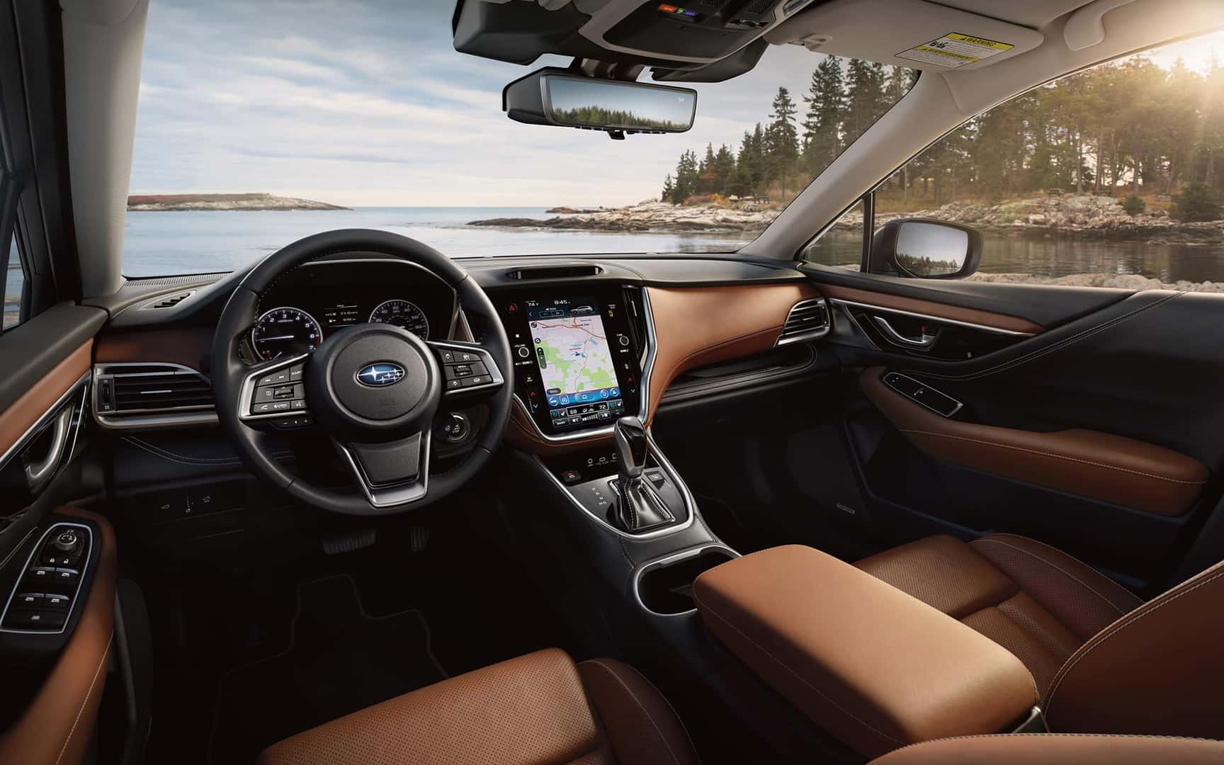 Interior drivers seat viewpoint shot of STARLINK Multimedia Navigation Screen in Outback Touring with Java Brown Nappa Leather