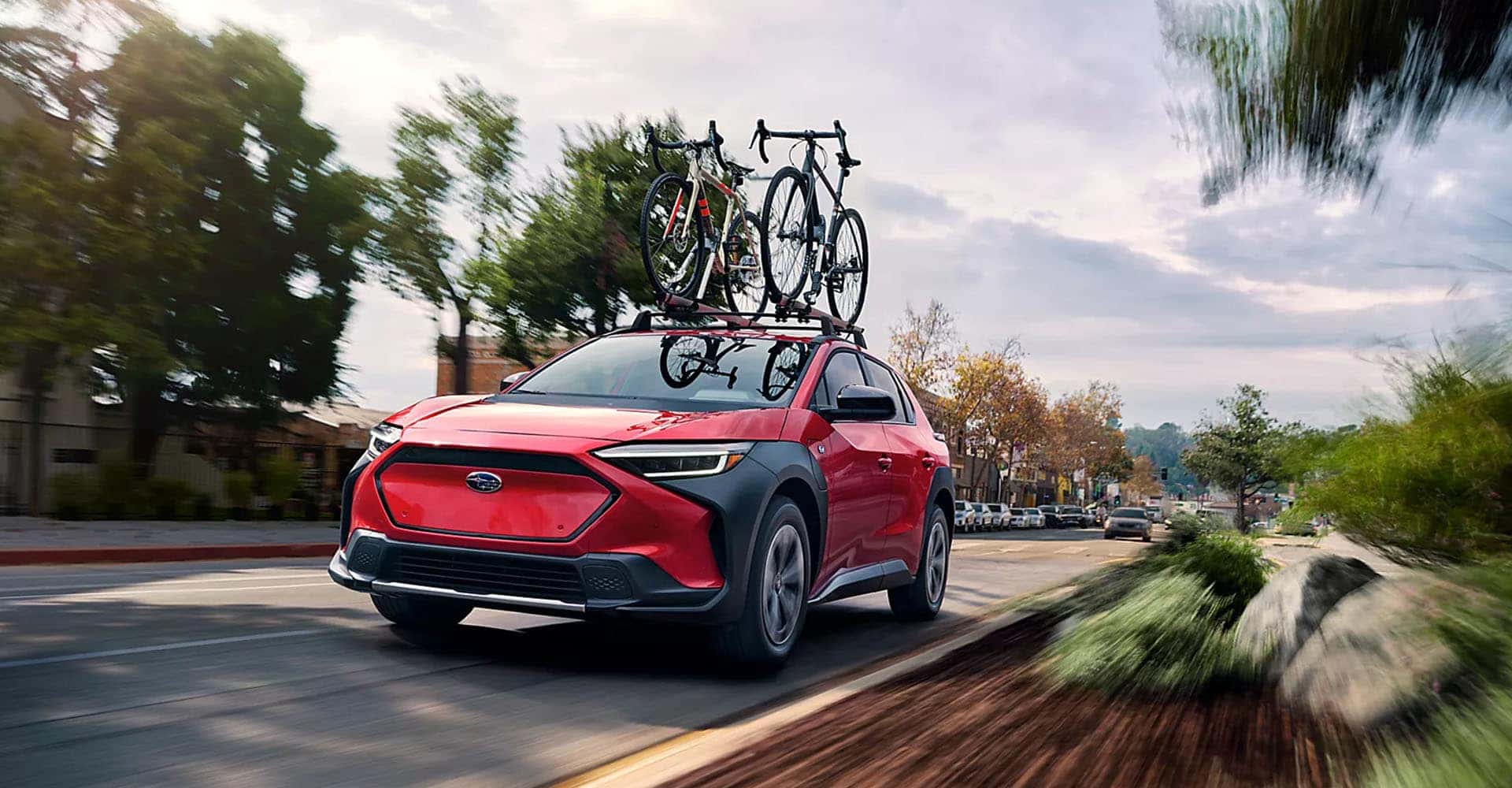 Premium shown in Elemental Red Pearl with accessory and aftermarket equipment