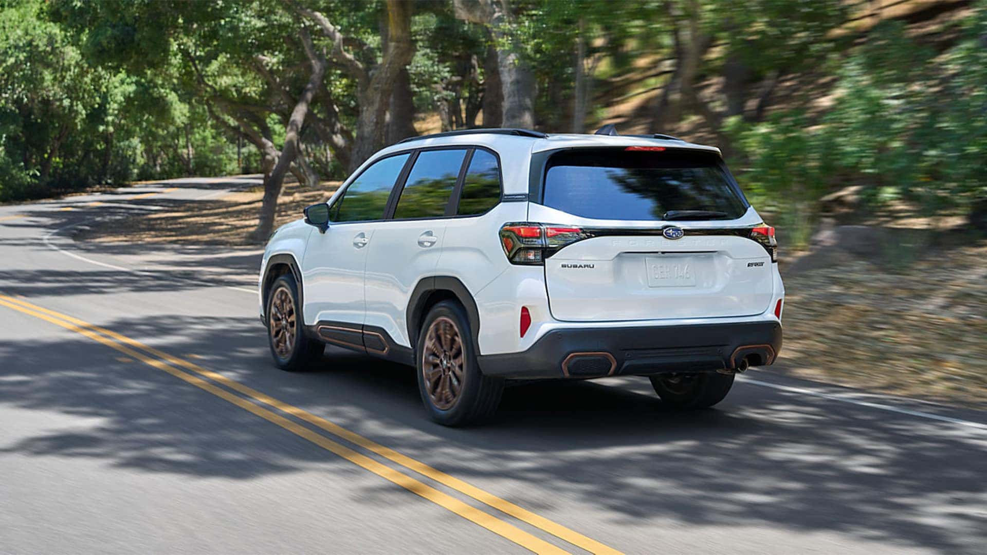 Back View of 2026 Subaru Forester Driving on the Road