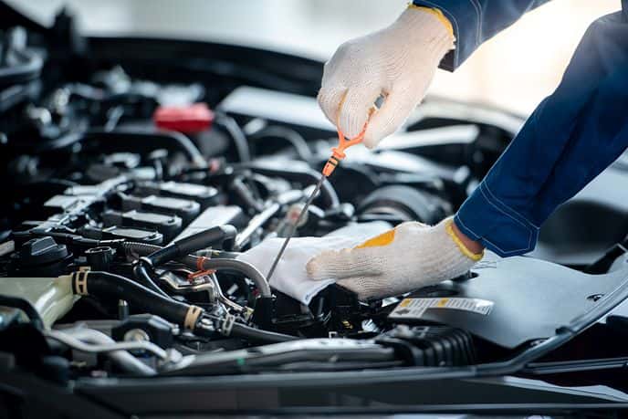 Vehicle being serviced by certified technician