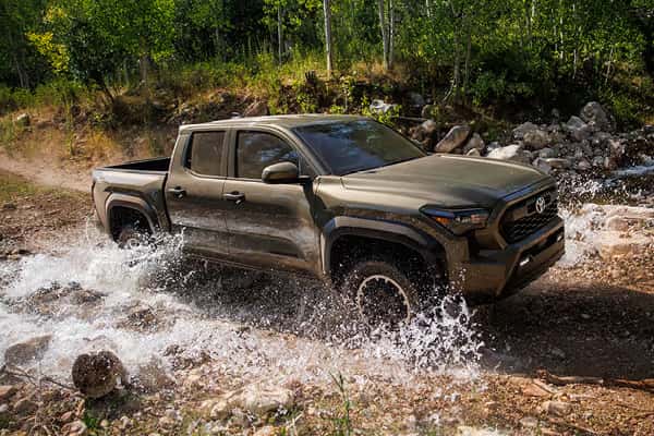 Toyota 4Runner on a snow-covered off-road trail demonstrating 4WD capability