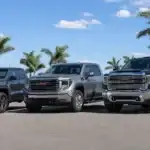 GMC trucks lined up in the sun