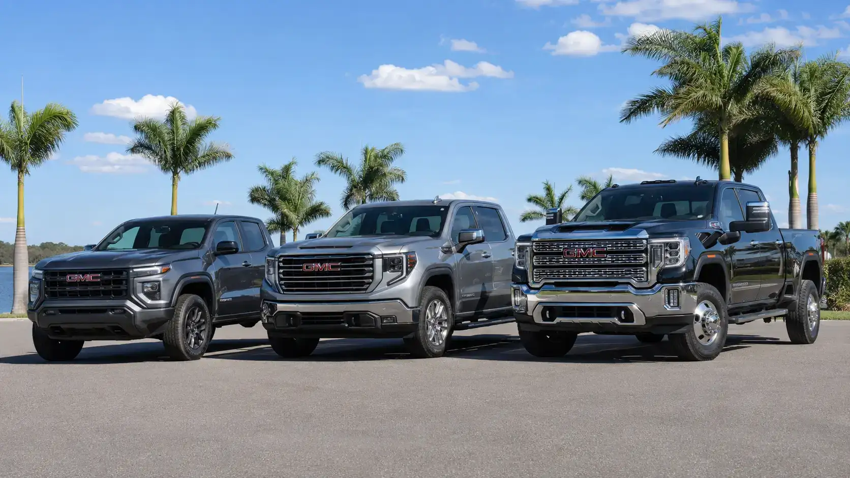GMC trucks lined up in the sun