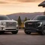 Twin GMC Denali SUVs at Golden Hour