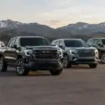 GMC Lineup Against Snowy Mountain Peaks