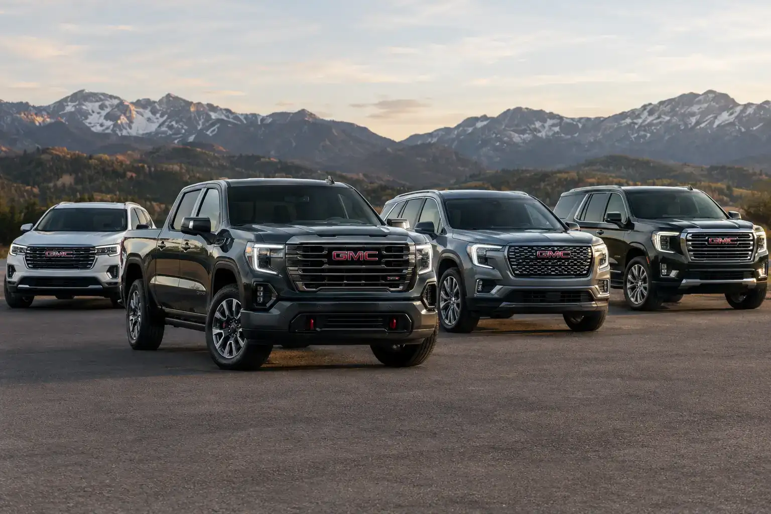 GMC Lineup Against Snowy Mountain Peaks