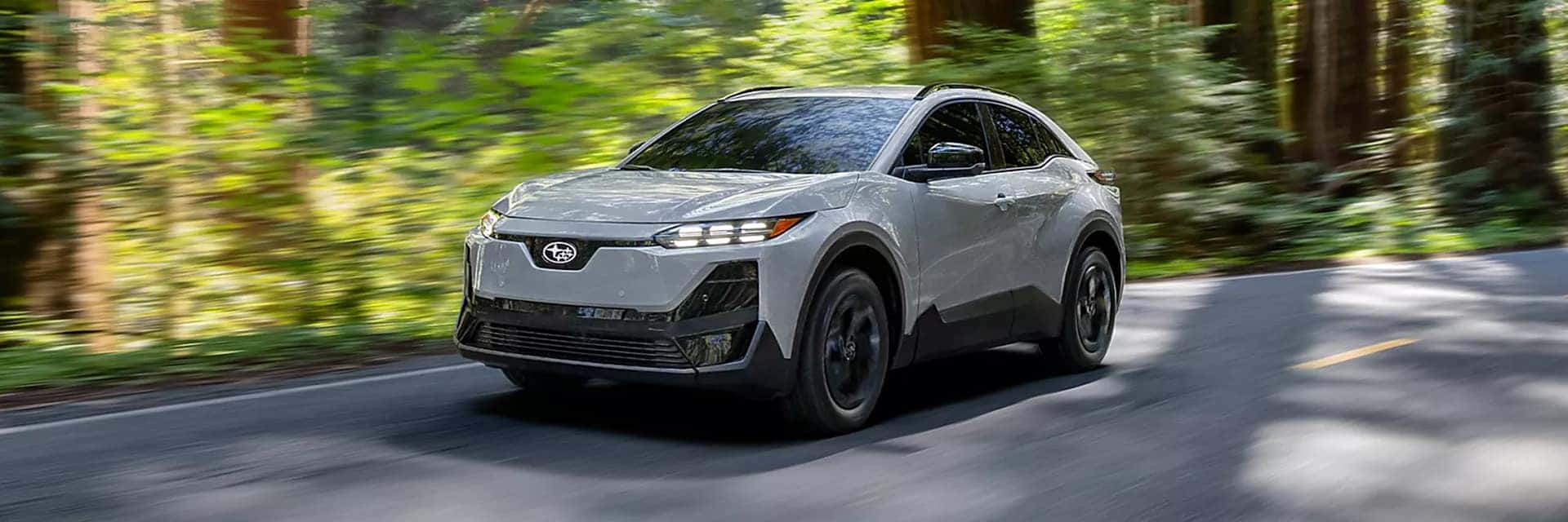 grey 2026 subaru uncharted driving on street