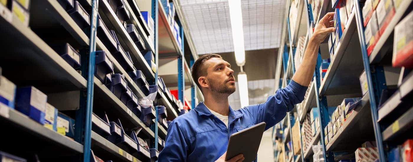 Technician grabbing parts