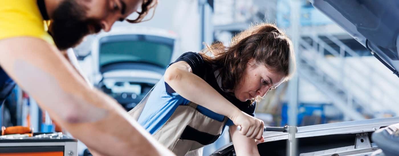 Technicians working on a vehicle