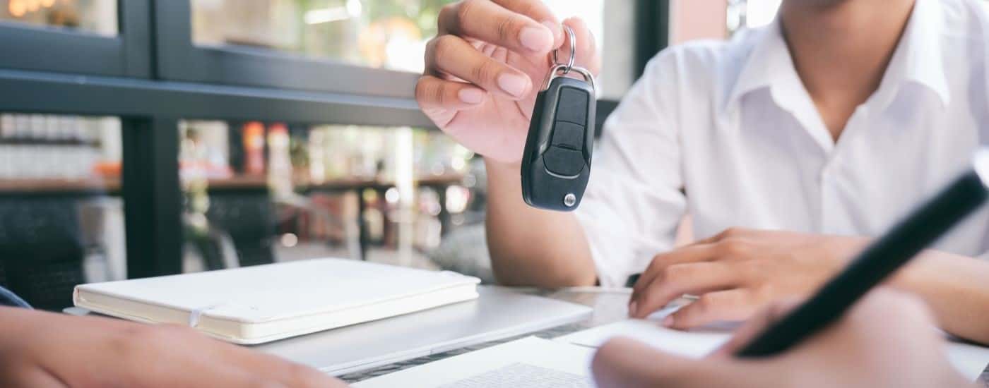 Person passing a key fob