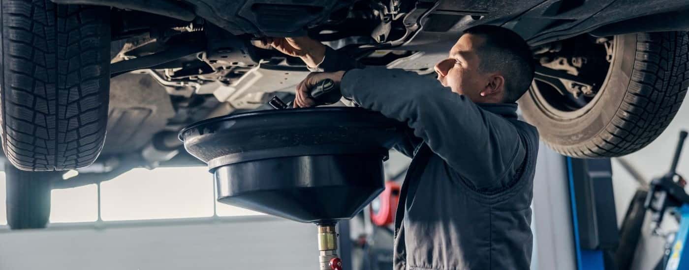 Technician working on a vehicle
