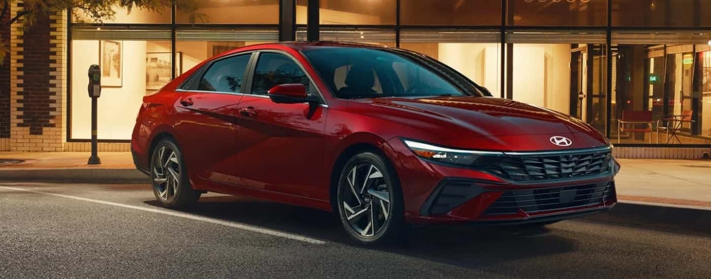 Red 2024 Hyundai Elantra Limited in a parking space