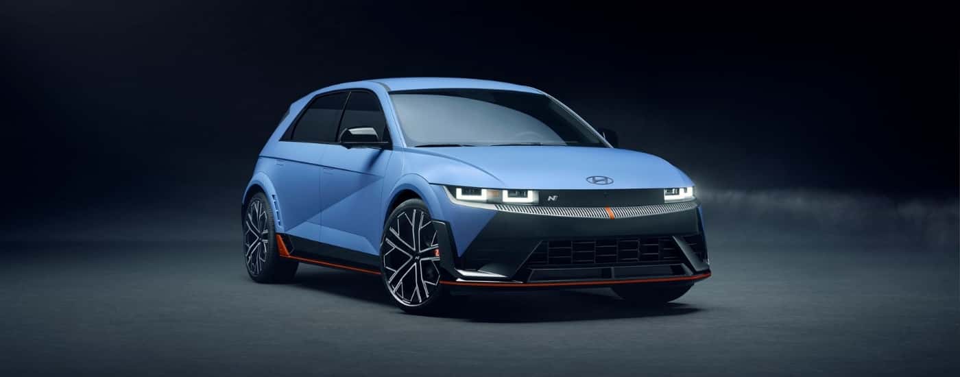 Blue 2026 Hyundai IONIQ 5 N in a dark warehouse