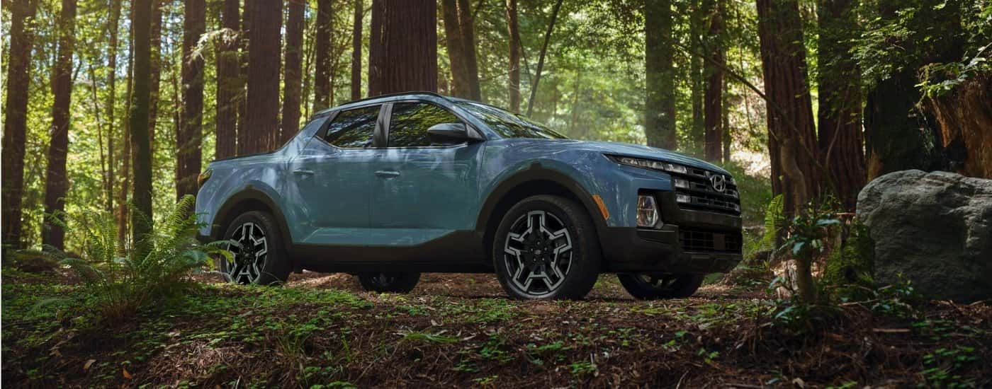 Blue 2027 Hyundai Santa Cruz Limited parked off-road
